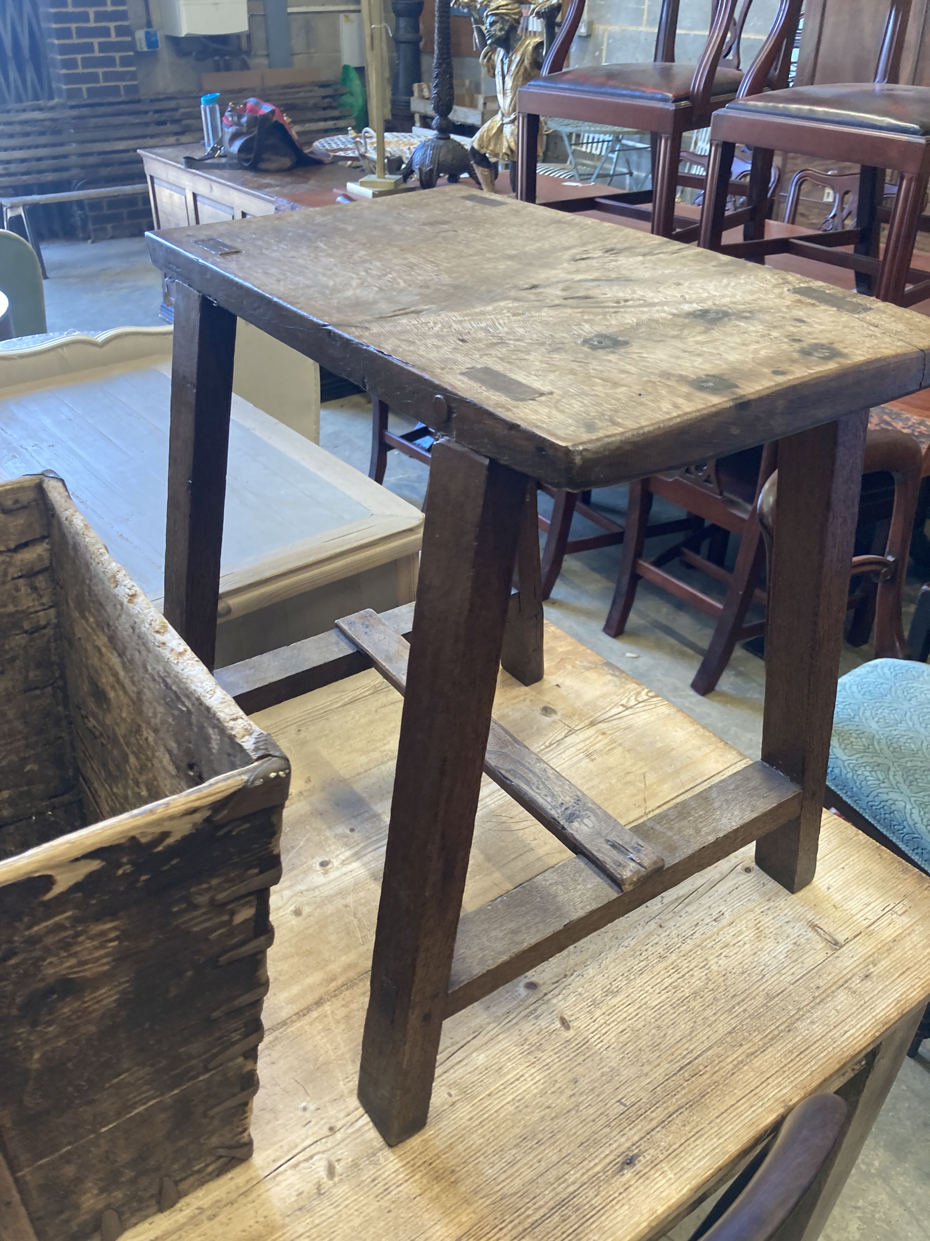 A rectangular provincial oak low table, width 55cm, depth 32cm, height 55cm together with a square Chinese bucket